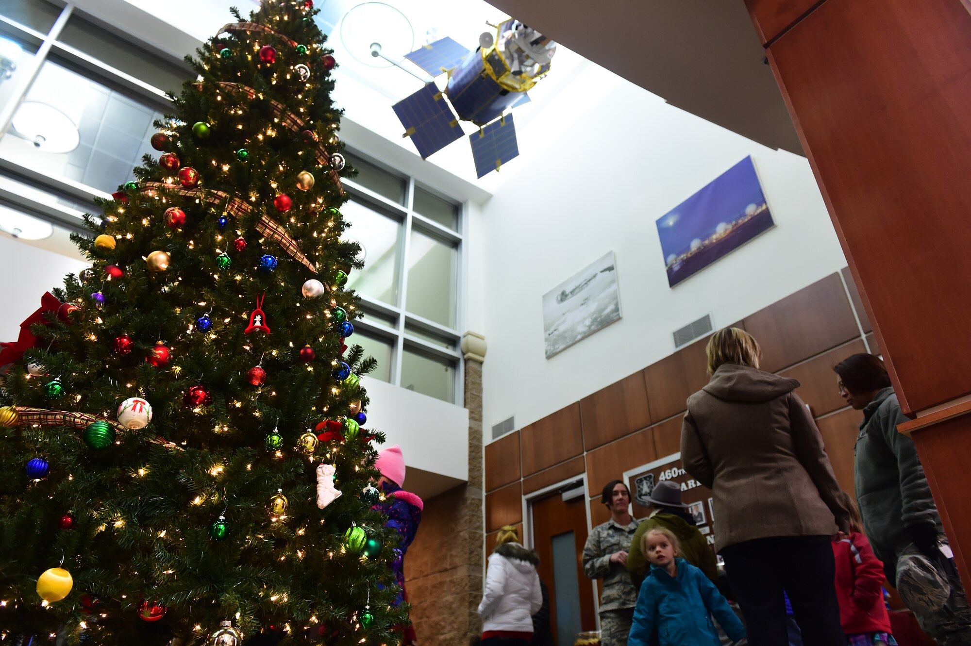 Team Buckley held an annual tree-lighting ceremony Dec. 2, 2015, on Buckley Air Force Base, Colo. Members of Team Buckley gathered to celebrate and enjoy refreshments in honor of the holiday season. (U.S. Air Force photo by Airman 1st Class Luke W. Nowakowski/Released)