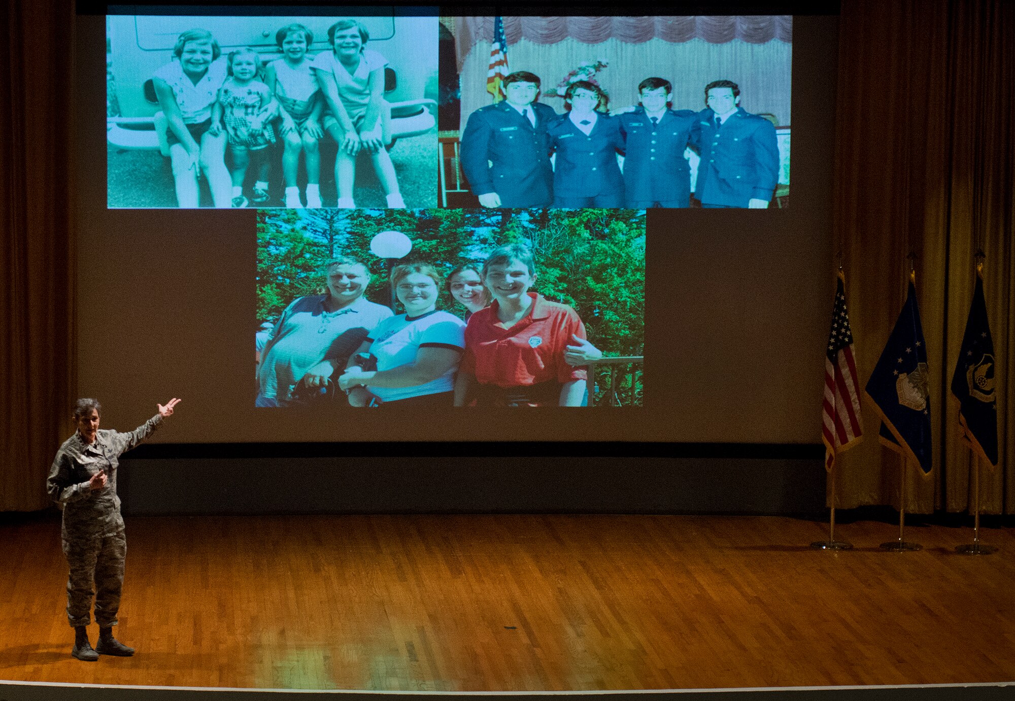 Gen. Ellen M. Pawlikowski, the Air Force Materiel Command commander, details her Air Force journey through photos during her Commander’s Call Dec. 1 at Eglin Air Force Base, Fla.  The Call was the last stop of her immersion visit to the base.  (U.S. Air Force photo/Samuel King Jr.)