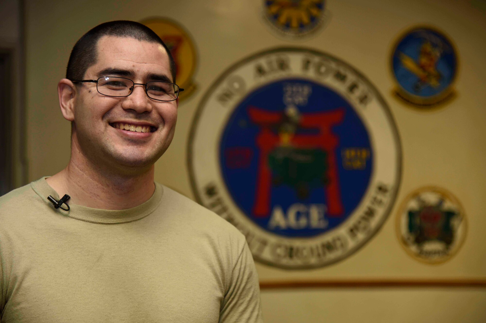 U.S. Air Force Airman 1st Class Taylor Moore, 35th Maintenance Squadron aerospace ground equipment journeyman, poses for a picture at Misawa Air Base, Japan, Dec. 2, 2015. Moore was chosen for Wild Weasel of the Week based on superior performance, outstanding work ethic and overall good conduct and discipline. (U.S. Air Force photo by Airman 1st Class Jordyn Fetter/Released)