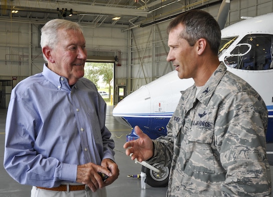 Retired Brig. Gen. Donald E. Haugen receives mission updates from Col. Robert Bruckner, 919th Special Operations Wing vice commander, during his final official visit to Duke Field, Florida, July 7, 2015.  Haugen commanded the 919th Tactical Airlift Group from July 1971 to March 1974 and paved the way for establishment of today’s 919th SOW.  (U.S. Air Force photo/Dan Neely)