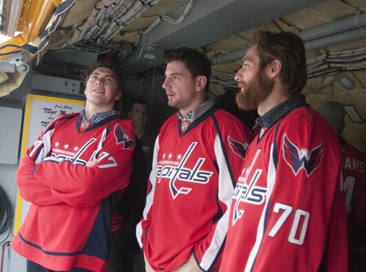 A group of Washington Capitals players hang out inside the cargo hold of a 459th Air Refueling Wing KC-135R Stratotanker during a team tour at Joint Base Andrews, Md., Dec. 1, 2015. The Capitals observed special performances by the U.S. Air Force band Max Impact, Honor Guard, 11th Wing Explosive Ordnance Disposal, as well as static displays from the 1st Helicopter Squadron and 113th Wing, Air National Guard. (U.S. Air Force photo by Staff. Sgt. Kat Justen)
