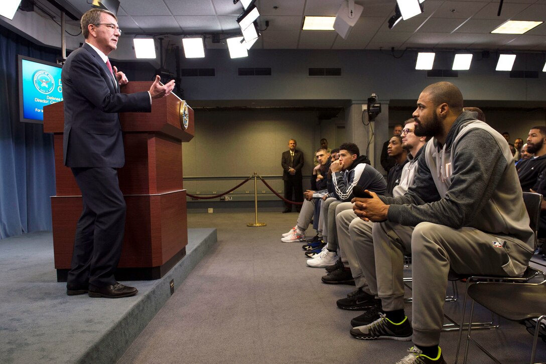 Defense Secretary Ash Carter speaks to members of the Phoenix Suns basketball team during a meeting at the Pentagon, Dec 3, 2015. DoD photo by Petty Officer 1st Class Tim D. Godbee