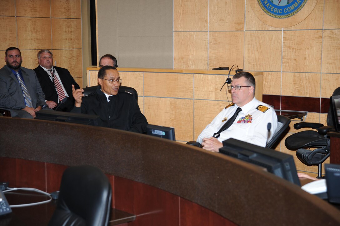 U.S. Navy Adm. Cecil D. Haney (center left), U.S. Strategic Command (USSTRATCOM) commander, briefs Royal Australian Navy Vice Adm. Raymond J. Griggs (right), Vice Chief of the Australian Defence Force, in the Battle Deck of the Global Operations Center during Griggs’ visit to USSTRATCOM Headquarters, Offutt Air Force Base, Neb., Nov. 30, 2015. While here, Griggs participated in a series of discussions with USSTRATCOM senior leaders to gain a better understanding of the command and its missions. Hosting Griggs’ visit is one of many of USSTRATCOM’s ongoing efforts to build and maintain enduring relationships with partner nations to confront the broad range of global challenges. One of nine DoD unified combatant commands, USSTRATCOM has global strategic missions, assigned through the Unified Command Plan, which include strategic deterrence; space operations; cyberspace operations; joint electronic warfare; missile defense; intelligence, surveillance and reconnaissance; combating weapons of mass destruction; and analysis and targeting. 