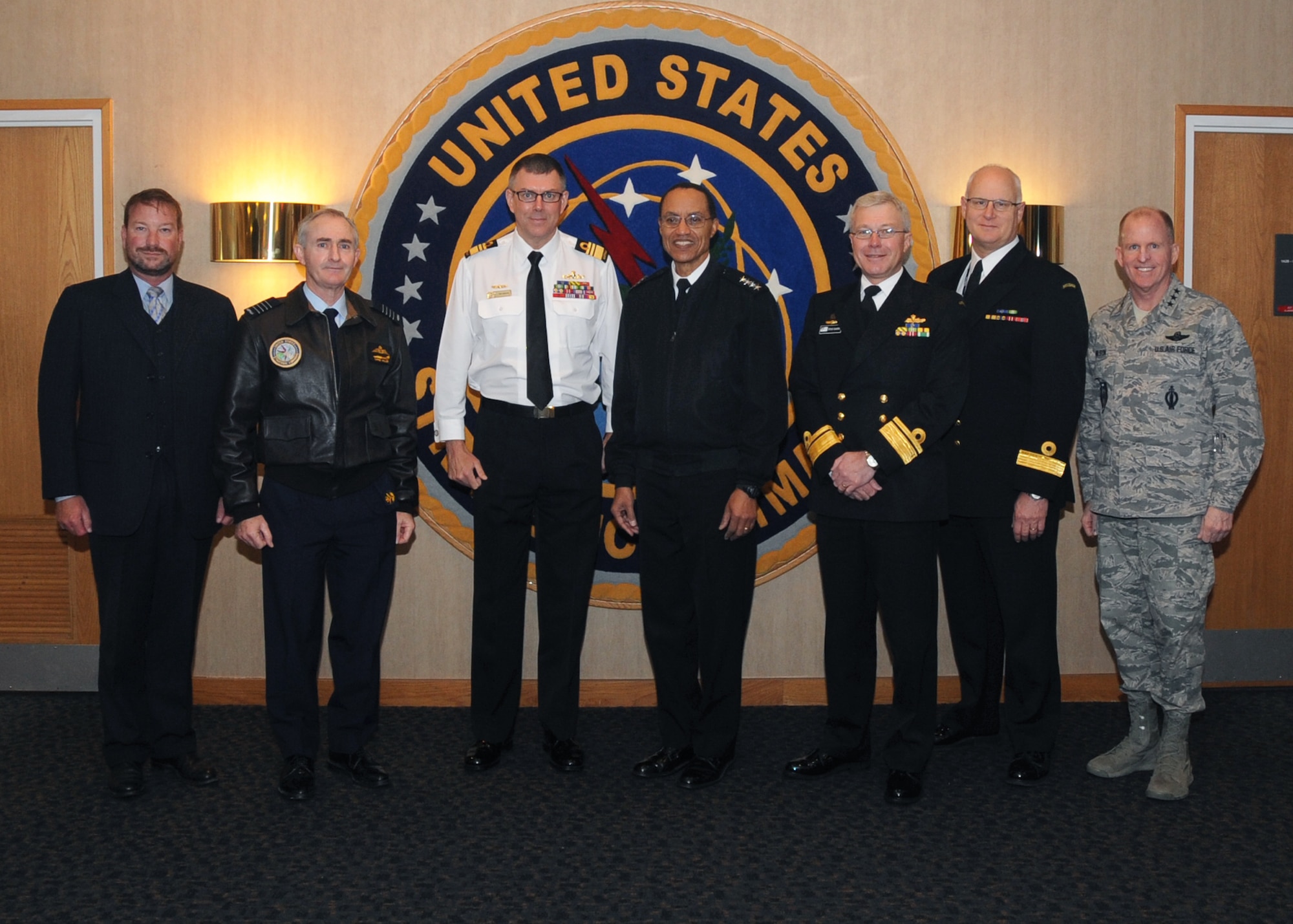 U.S. Navy Adm. Cecil D. Haney (center), U.S. Strategic Command (USSTRATCOM) commander, poses for a photo with Royal Australian Navy Vice Adm. Raymond J. Griggs (center left), Vice Chief of the Australian Defence Force, during Griggs’ visit to USSTRATCOM Headquarters, Offutt Air Force Base, Neb., Nov. 30, 2015. While here, Griggs participated in a series of discussions with USSTRATCOM senior leaders to gain a better understanding of the command and its missions. Hosting Griggs’ visit is one of many of USSTRATCOM’s ongoing efforts to build and maintain enduring relationships with partner nations to confront the broad range of global challenges. One of nine DoD unified combatant commands, USSTRATCOM has global strategic missions, assigned through the Unified Command Plan, which include strategic deterrence; space operations; cyberspace operations; joint electronic warfare; missile defense; intelligence, surveillance and reconnaissance; combating weapons of mass destruction; and analysis and targeting. Also pictured (right to left) are: U.S. Air Force Lt. Gen. Stephen W. Wilson, USSTRATCOM deputy commander; Royal Australian Navy Commodore David Scott, Director General for Australian Strategic Capability Coordination; Royal Australian Navy Rear Adm. Steve Gilmore, head of the Australian Defence Staff in Washington, D.C.; Royal Australian Air Force Group Capt. Christopher D. Miller, Australian Liaison Officer to USSTRATCOM; and Mr. George Bailey, Australian Defence Emerging Strategic Capabilities director. (USSTRATCOM photo by Steve Cunningham)