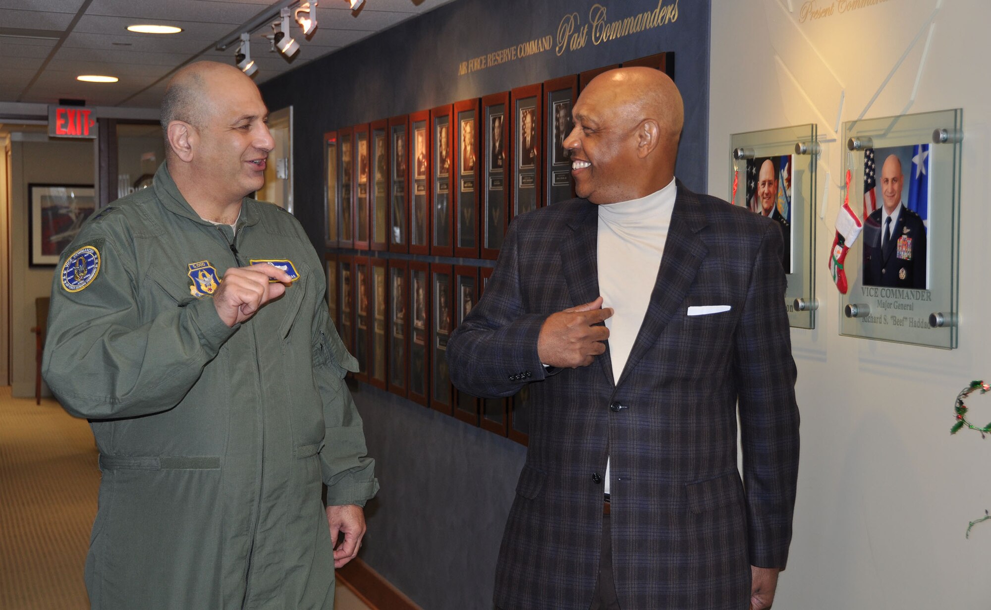 Maj. Gen. Richard S. Haddad, Air Force Reserve Command vice commander and Mr. John Grant, Air Force Reserve Celebration Bowl executive director, take a tour of the headquarters prior to meeting to discuss the upcoming bowl game. The Air Force Reserve will be the title sponsor for the Air Force Reserve Celebration Bowl, slated for Dec. 19 at the Georgia Dome in Atlanta. (Air Force photo/Master Sgt Chance Babin)