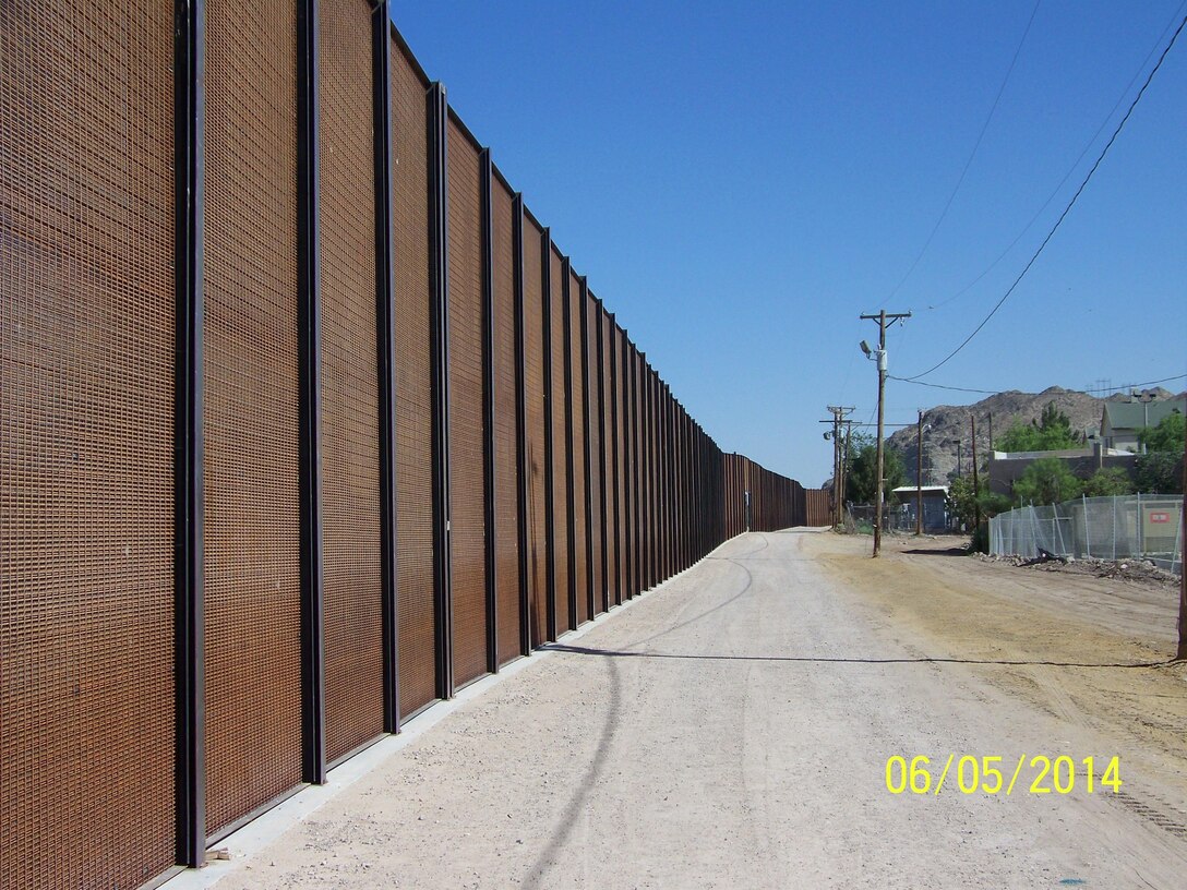 "A portion of the border fence in El Paso, Texas." Photo by Art Aranda, June 5, 2014.