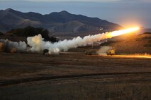 Marines fire a High-Mobility Artillery Rocket System in support of Steel Knight aboard Marine Corps Base Camp Pendleton, Calif., Dec. 4, 2015. Steel Knight is a 1st Marine Division led exercise which enables the Marines and sailors to operate in a realistic combined-arms environment to develop skill sets necessary to operate as a fully capable Marine Air Ground Task Force. The Marines are assigned to Battery Q, 5th Battalion, 11th Marine Regiment, 1st Mar. Div.