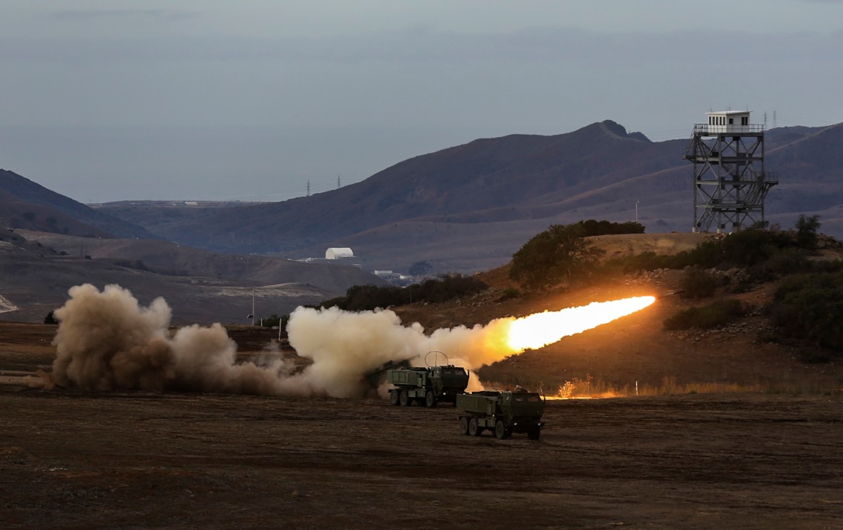 Marines fire a High-Mobility Artillery Rocket System in support of Steel Knight aboard Marine Corps Base Camp Pendleton, Calif., Dec. 4, 2015. Steel Knight is a 1st Marine Division led exercise which enables the Marines and sailors to operate in a realistic combined-arms environment to develop skill sets necessary to operate as a fully capable Marine Air Ground Task Force. The Marines are assigned to Battery Q, 5th Battalion, 11th Marine Regiment, 1st Mar. Div.