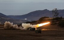 Marines fire a High-Mobility Artillery Rocket System in support of Steel Knight aboard Marine Corps Base Camp Pendleton, Calif., Dec. 4, 2015. Steel Knight is a 1st Marine Division led exercise which enables the Marines and sailors to operate in a realistic combined-arms environment to develop skill sets necessary to operate as a fully capable Marine Air Ground Task Force. The Marines are assigned to Battery Q, 5th Battalion, 11th Marine Regiment, 1st Mar. Div.