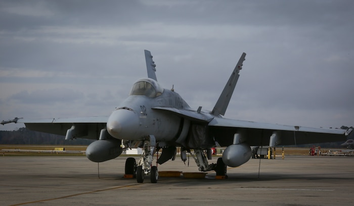 An F/A- 18C Hornet rests on the flight line Dec. 1 aboard Marine Corps Air Station Beaufort after returning from Integrated Training Exercise aboard Marine Corps Air Ground Combat Center, Twentynine Palms, Calif., from Oct. 16- Nov. 20. Marine Fighter Attack Squadron 122 conducted the training exercise to prepare for an upcoming deployment in early 2016 and to increase combat proficiency and readiness. The jet is with VMFA-122, Marine Aircraft Group 31.