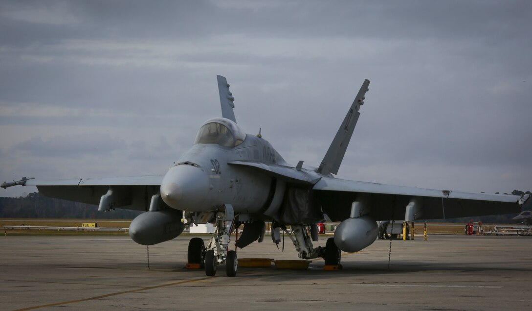 An F/A- 18C Hornet rests on the flight line Dec. 1, 2015 at Marine Corps Air Station Beaufort after returning from Integrated Training Exercise aboard Marine Corps Air Ground Combat Center, Twentynine Palms, Calif., from Oct. 16- Nov. 20. Marine Fighter Attack Squadron 122 conducted the training exercise to prepare for an upcoming deployment in early 2016 and to increase combat proficiency and readiness. The jet is with VMFA-122, Marine Aircraft Group 31.