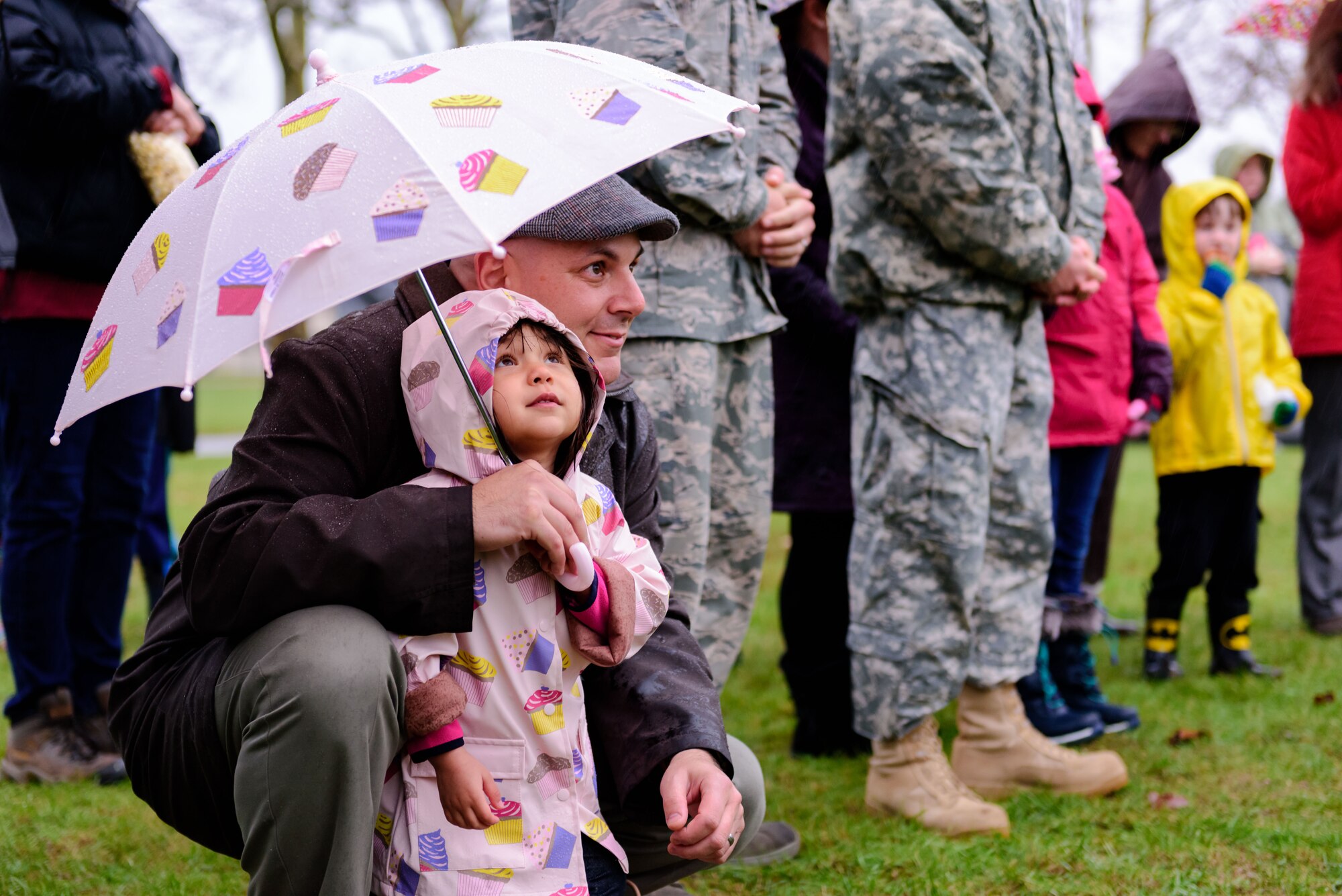 The joint base community gathers for a tree and menorah lighting ceremony outside of Wurman Hall Dec. 2, 2015 at Joint Base McGuire-Dix-Lakehurst, NJ.  Event goers were treated to roasted chestnuts, kettle corn, hot cocoa and hot apple cider; and children had a chance to visit with Santa and Mrs. Claus.  (U.S. Air Force photo by Robert Williard/Released)