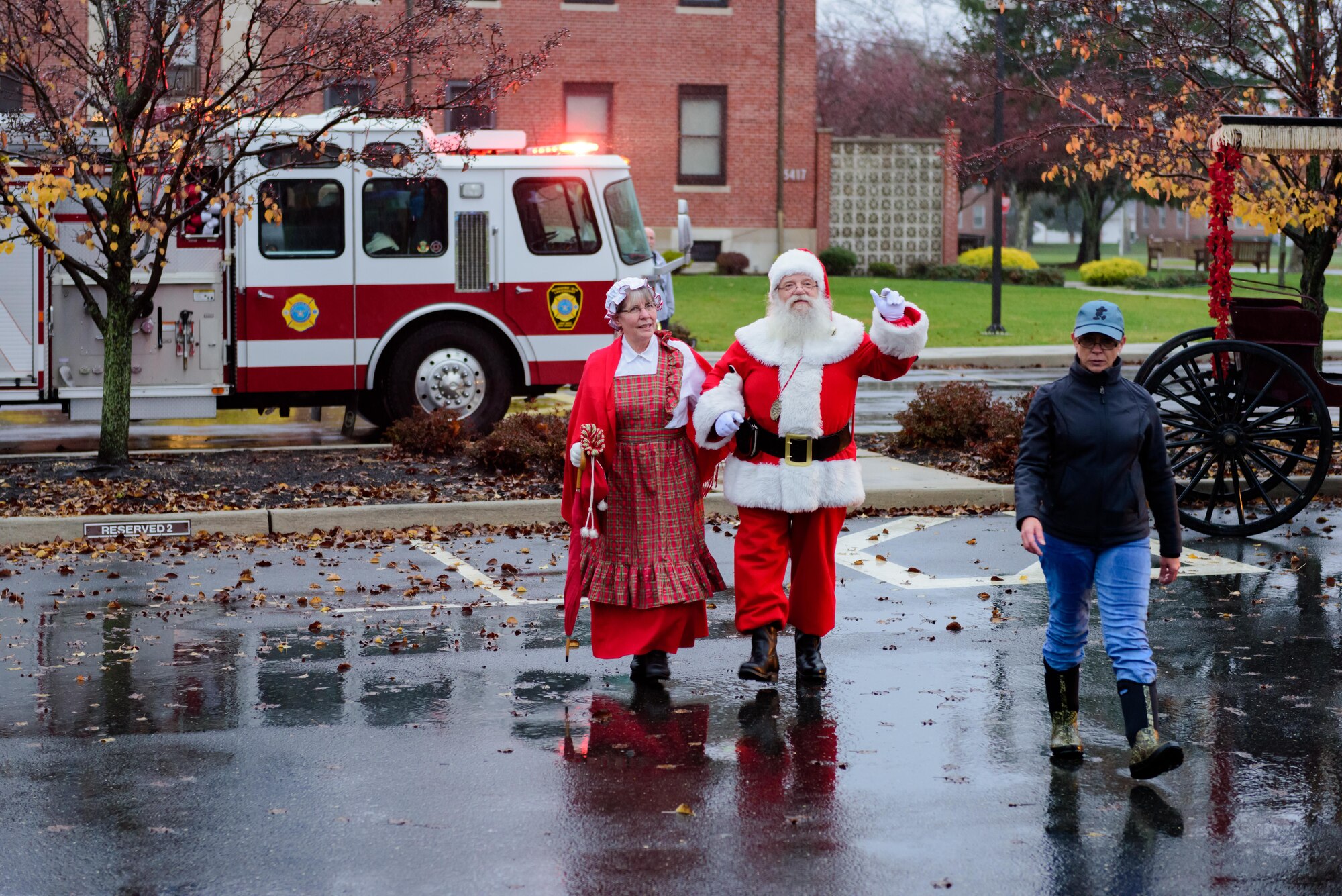 The joint base community gathers for a tree and menorah lighting ceremony outside of Wurman Hall Dec. 2, 2015 at Joint Base McGuire-Dix-Lakehurst, NJ.  Event goers were treated to roasted chestnuts, kettle corn, hot cocoa and hot apple cider; and children had a chance to visit with Santa and Mrs. Claus.  (U.S. Air Force photo by Robert Williard/Released)