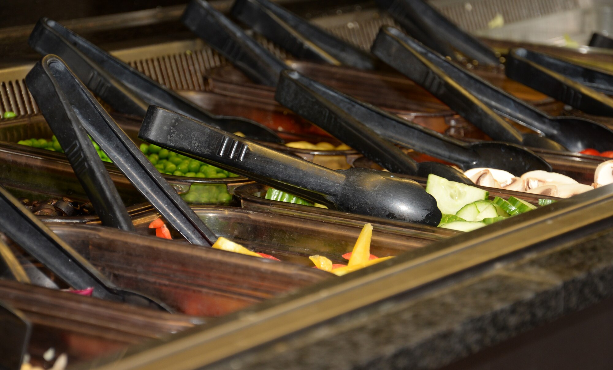 Salad is ready for customers during lunch at the 100th Force Support Squadron Gateway Dining Facility Nov. 23, 2015, on RAF Mildenhall, England. Healthy food options are available to those who eat in the facility. (U.S. Air Force photo by Gina Randall/Released)