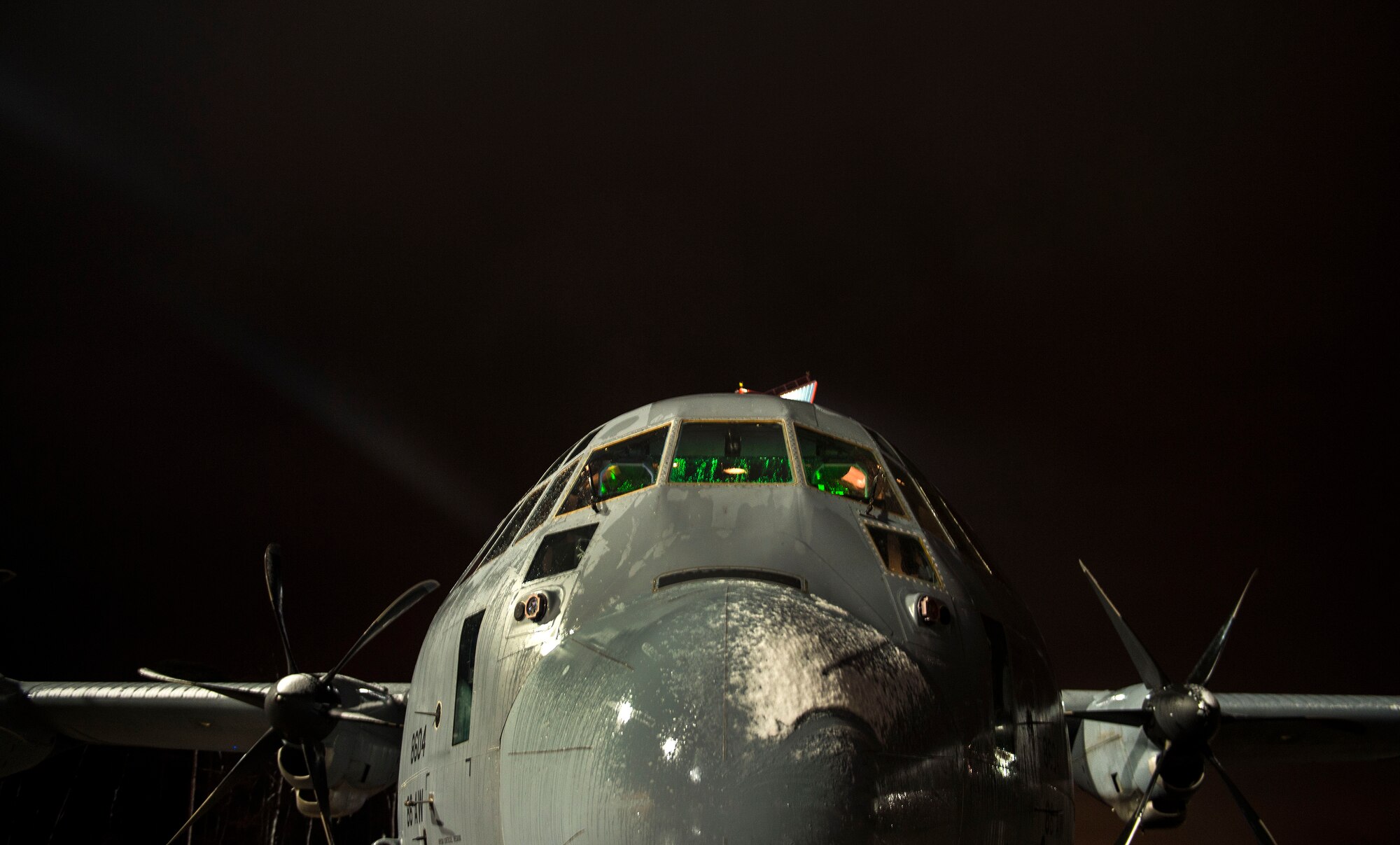 A C-130J Super Hercules from the 37th Airlift Squadron is prepped before a training exercise at Ramstein Air Base, Germany, Nov. 25, 2015. Aircrew members spent more than 7 hours to prepare and fly to perform air drop training over U.S. Army Garrison Grafenwoehr, Germany. (U.S. Air Force photo/Staff Sgt. Sara Keller)