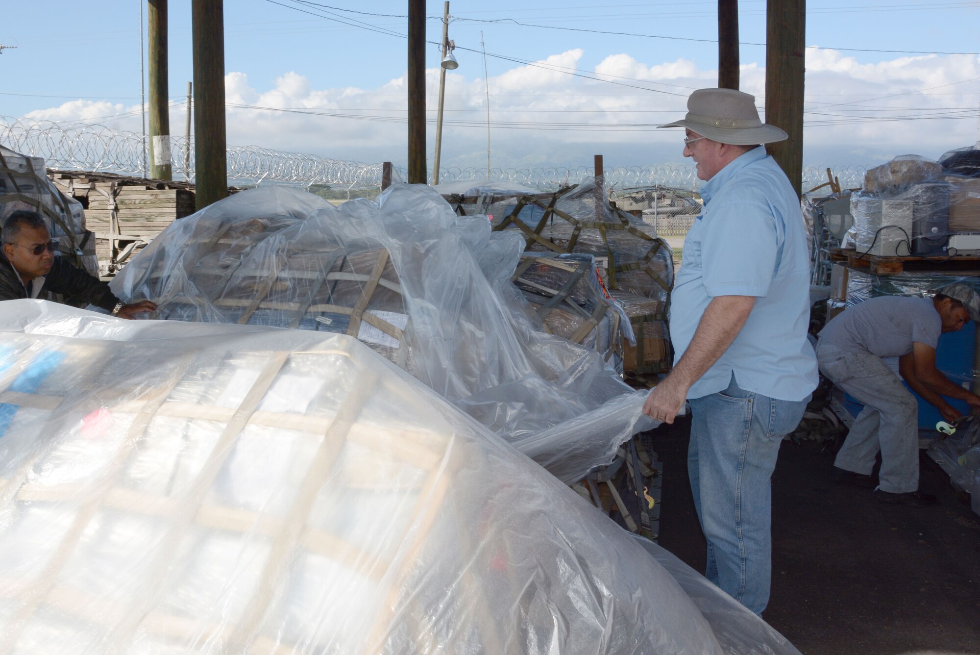 Dean Lowman, founder and president of Heavens Reach Ministries and Alcanzando Desde El Cielo Ministries, poses for a portrait while picking up donated cargo on Soto Cano Air Base, Honduras, Dec. 3, 2015. The cargo was donated by Heavens Reach Ministries in the United States and utilized the Denton Program, a program that allows private citizens and non-government organizations to use space available on U.S. cargo planes to ship humanitarian supplies to countries in need. (U.S. Air Force photo by Martin Chahin/Released)