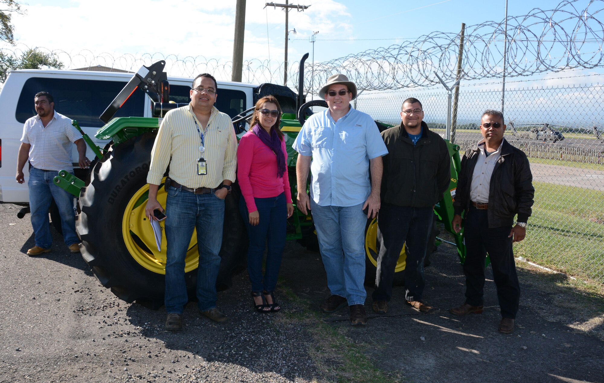 Members with the Alcanzando Desde El Cielo Ministries pick up donated cargo at Soto Cano Air Base, Honduras, Dec. 3, 2015. The cargo was donated by Heavens Reach Ministries in the United States and utilized the Denton Program, a program that allows private citizens and non-government organizations to use space available on U.S. cargo planes to ship humanitarian supplies to countries in need. (U.S. Air Force photo by Martin Chahin/Released)