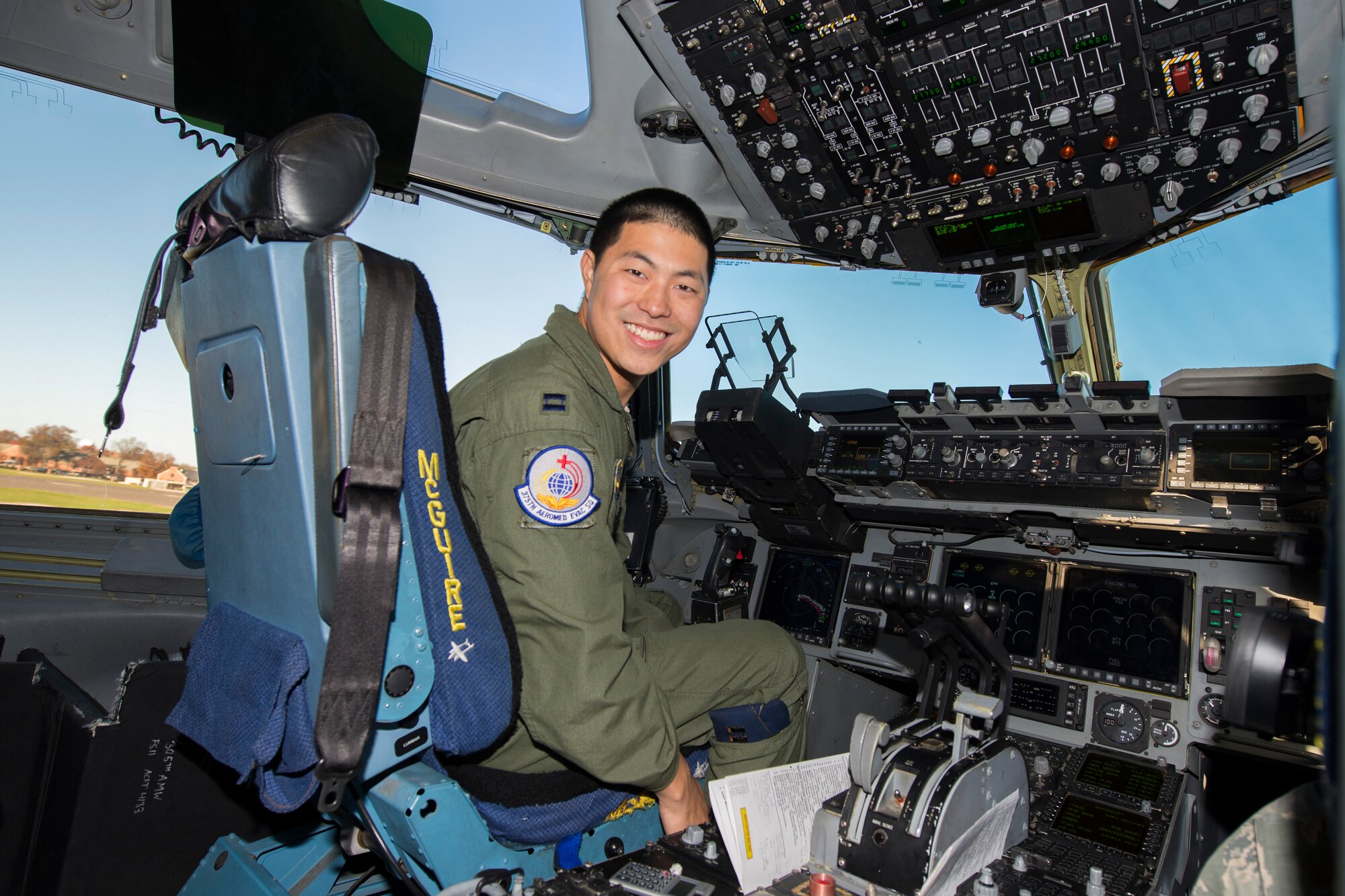 Capt. Stephen Ching, 6th Airlift Squadron C-17 pilot, Joint Base McGuire-Dix-Lakehurst, New Jersey, flys to Pope Field, North Carolina, for a collaborative Air Mobility Command training initiative Nov. 16–20. Ching explained that the size and versatility of the aircraft allows plenty of room for people and equipment which makes it an exceptional aircraft for aeromedical training. (U.S. Air Force photo by Airman 1st Class Melissa Estevez)