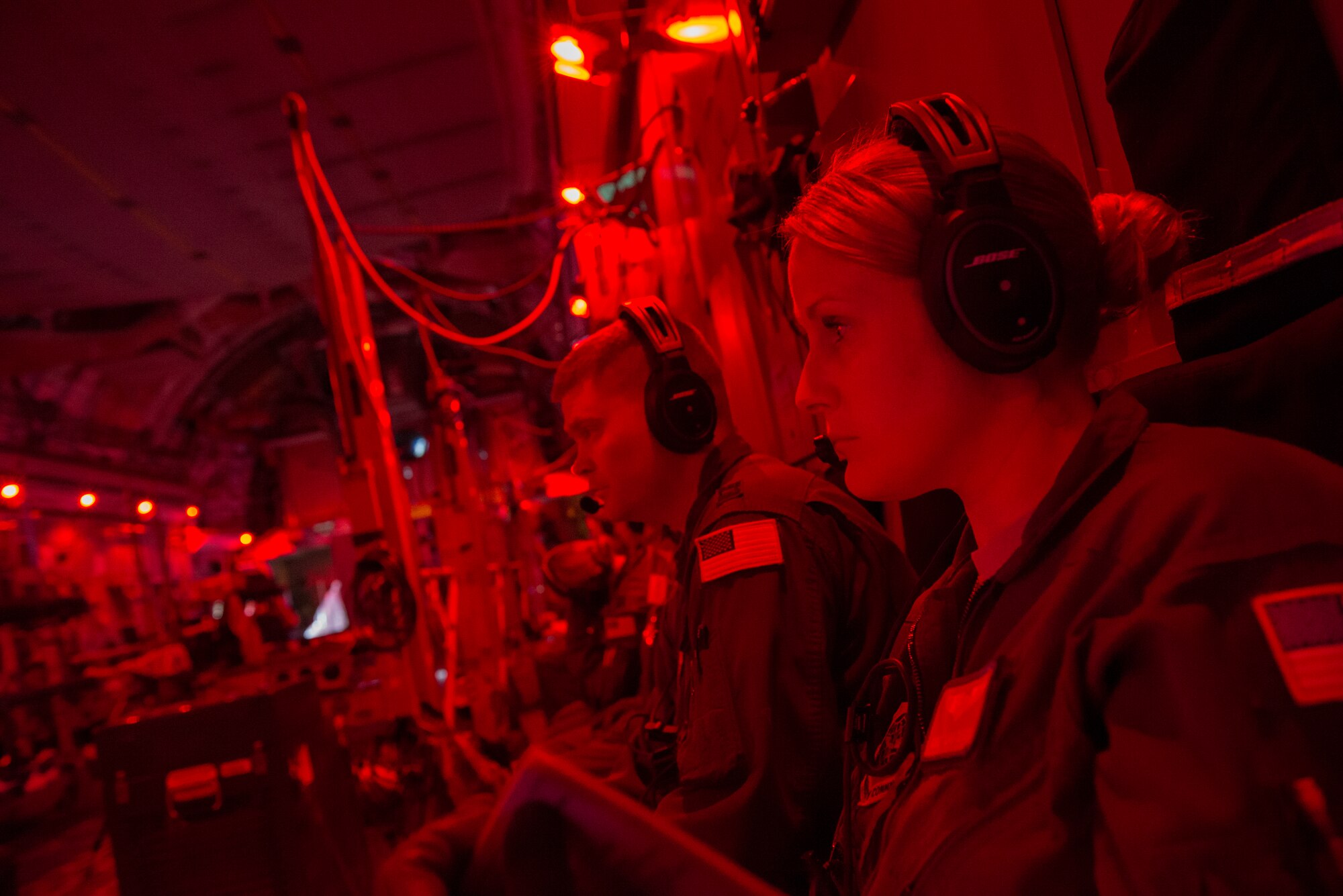 Aeromedical evacuation experts, Scott Air Force Base, Illinois, sit while a tactical landing is conducted, during a collaborative Air Mobility Command training initiative Nov. 16–20. A propulsive lift system allows the C-17 to achieve safe landings on short runways. The C-17 is capable of landing a full payload in less than 3,000ft. (U.S. Air Force photo by Airman 1st Class Melissa Estevez)