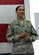 Chief Master Sgt. Sonia Lee, 28th Bomb Wing command chief, addresses Team Ellsworth at an all call at Ellsworth Air Force Base, S.D., Dec. 3, 2015. Lee touched on what the Air Force core values mean to her and discussed her personnelist background, transition to the bomber community and family. (U.S. Air Force photo by Senior Airman Hailey R. Staker/Released)