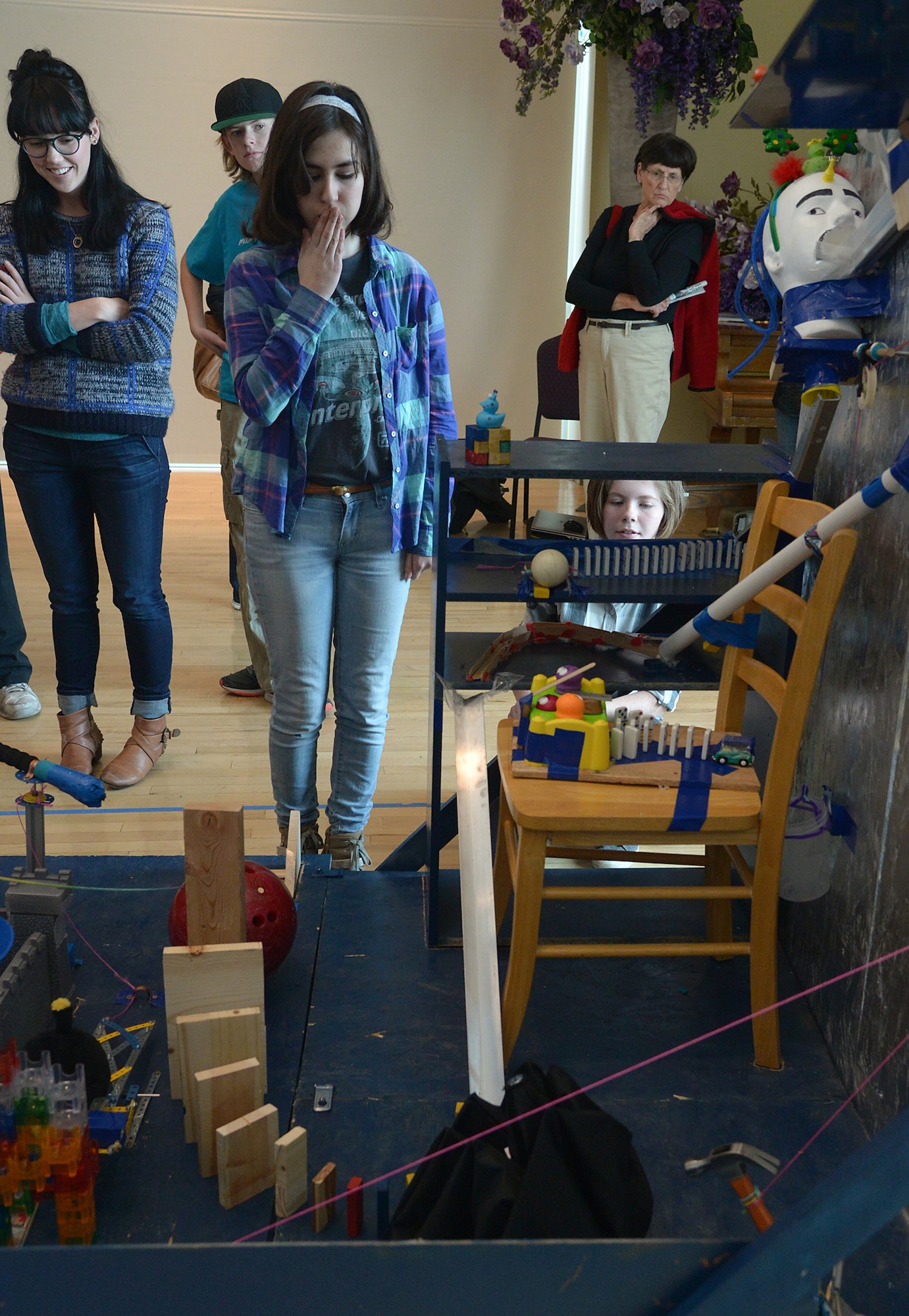 “Magical Nerdcakes” team members compete during a Rube Goldberg Machine Contest Dec. 4 at Weber State University, Ogden, Utah. A Rube Goldberg Machine is a complex creation designed to perform a simple task. (U.S. Air Force photo by Alex R. Lloyd)