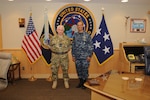 U.S. Navy Adm. Cecil D. Haney (right), U.S. Strategic Command commander, poses for a photo with U.K. Royal Air Force Air Marshal Phil C. Osborn, U.K. Chief of Defence Intelligence, during Osbornâ€™s visit to USSTRATCOM Headquarters, Offutt Air Force Base, Neb., Dec. 3, 2015. While here, Osborn participated in a series of discussions with USSTRATCOM senior leaders to gain a better understanding of the command and its missions. Hosting Osborn's visit is one of many of USSTRATCOM's ongoing efforts to build and maintain enduring relationships with partner nations to confront the broad range of global challenges. One of nine DoD unified combatant commands, USSTRATCOM has global strategic missions, assigned through the Unified Command Plan, which include strategic deterrence; space operations; cyberspace operations; joint electronic warfare; missile defense; intelligence, surveillance and reconnaissance; combating weapons of mass destruction; and analysis and targeting. (USSTRATCOM photo by Steve Cunningham)