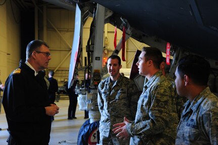 Royal Australian Navy Vice Adm. Ray Griggs (left), Vice Chief of the Australian Defence Force, speaks with U.S. Air Force Senior Airman Adam Sweet, a 509th Aircraft Maintenance Squadron crew chief, about the capabilities of the B-2 Spirit during Griggsâ€™s visit to Whiteman Air Force Base, Mo., Dec. 1, 2015. The visit is one of many ongoing efforts by U.S. Strategic Command (USSTRATCOM) to build and maintain enduring relationships with partner nations to confront the broad range of global challenges. While at Whiteman AFB, Griggs visited different base facilities and met with USSTRATCOM senior leaders to acquire a better understanding of the command and its global missions, which include strategic deterrence; space operations; cyberspace operations; joint electronic warfare; global strike; missile defense; intelligence, surveillance and reconnaissance; combating weapons of mass destruction; and analysis and targeting. (U.S. Air Force photo by Senior Airman Keenan Berry)