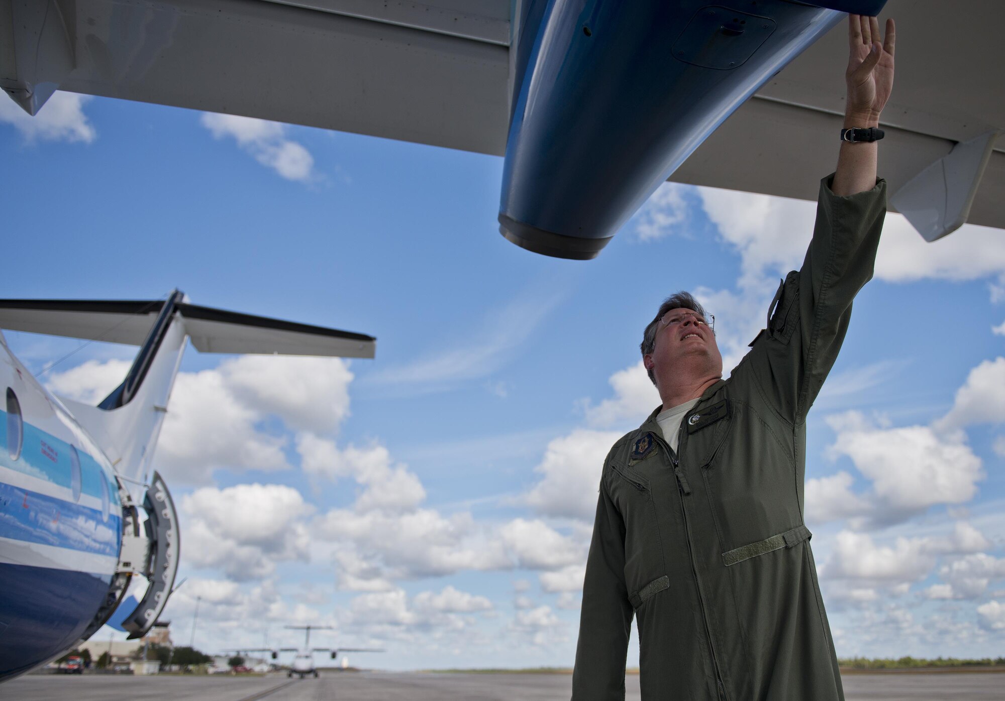 Senior Master Sgt. Bill Bethke, 711th Special Operations Squadron, completes his postflight checks on a C-146 Wolfhound at Duke Field, Fla., Oct. 21.  The Air Force Special Operations Wing aircraft are used specifically in the training and operation of the 919th Special Operations Wing’s nonstandard aviation mission.  (U.S. Air Force photo/Tech. Sgt. Sam King)