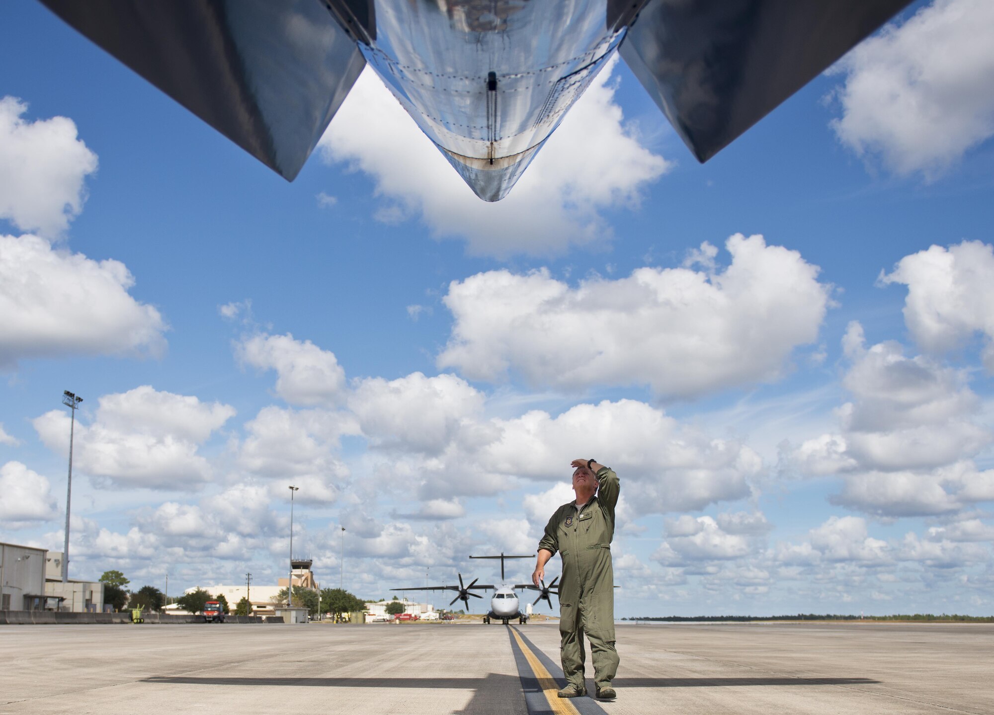 Lt. Col. Michael Theriot, 711th Special Operations Squadron, completes his postflight checks on a C-146 Wolfhound at Duke Field, Fla., Oct. 21.  The Air Force Special Operations Wing aircraft are used specifically in the training and operation of the 919th Special Operations Wing’s nonstandard aviation mission.  (U.S. Air Force photo/Tech. Sgt. Sam King)