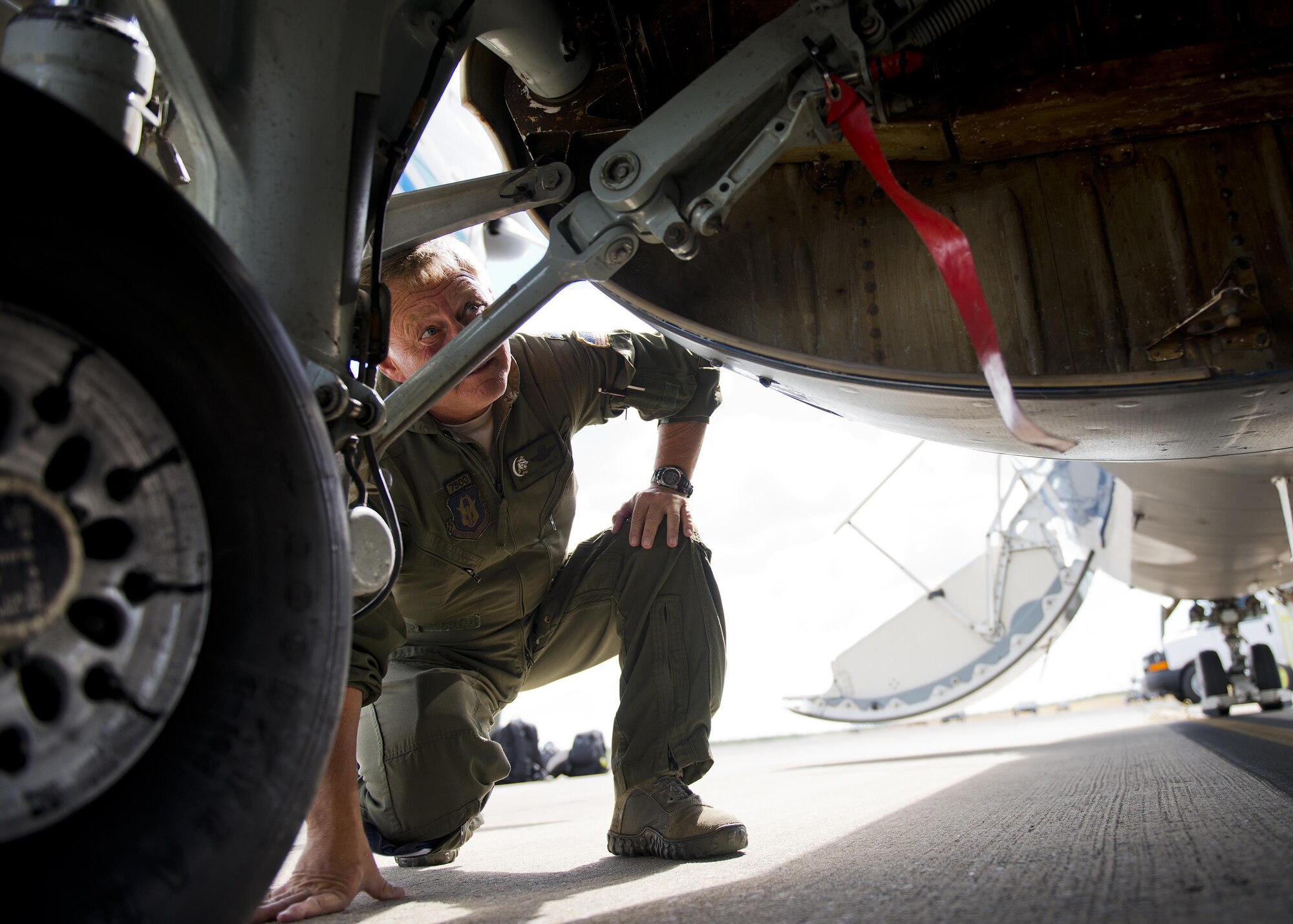 Lt. Col. Michael Theriot, 711th Special Operations Squadron, completes his postflight checks on a C-146 Wolfhound at Duke Field, Fla., Oct. 21.  The Air Force Special Operations Wing aircraft are used specifically in the training and operation of the 919th Special Operations Wing’s nonstandard aviation mission.  (U.S. Air Force photo/Tech. Sgt. Sam King)