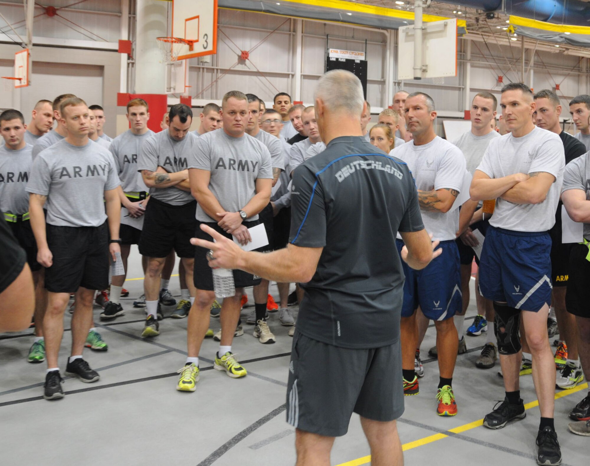 Sgt. Michael Kern, German Armed Forces liaison to Fort Rucker, GA, briefs Guardsmen and Army ROTC Cadets on the physical test portion of the German Armed Forces Proficiency Badge on November 6, 2015 in Ames, Iowa.  (Official Air Guard photo by Capt. Jeremy J. McClure/Released) 