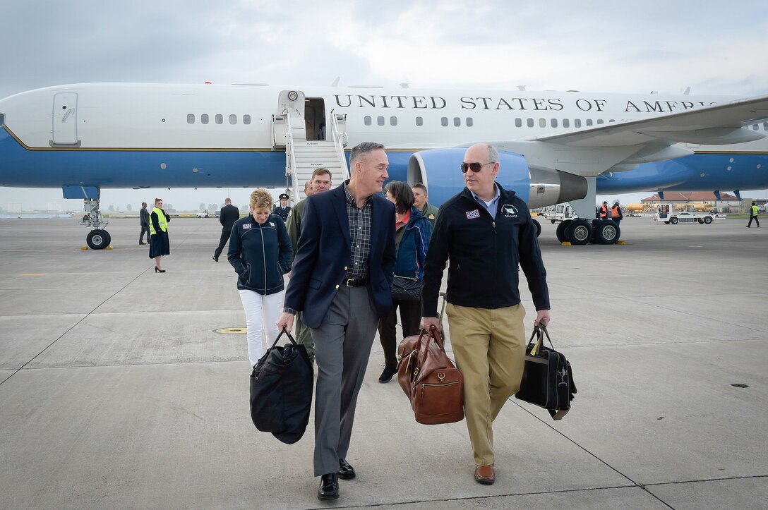 U.S. Marine Corps Gen. Joseph F. Dunford Jr., front left, chairman of the Joint Chiefs of Staff, walks on the flightline upon arriving on Naval Air Station Sigonella, Italy, Dec. 5, 2015. Dunford is traveling with entertainers to visit deployed service members during the 2015 USO Holiday Tour. DoD photo by D. Myles Cullen