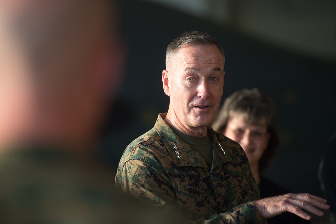 U.S. Marine Corps Gen. Joseph F. Dunford Jr., chairman of the Joint Chiefs of Staff, talks with U.S. Marines stationed on Naval Air Station Sigonella, Italy, Dec. 5, 2015. DoD photo by D. Myles Cullen