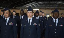 Airmen of the 919th Special Operations Civil Engineer Squadron stand at attention prior to an open ranks inspection Dec. 5 at Duke Field, Fla.  The goal of the inspection is for the Airmen to ensure their service dress and appearance conform to Air Force standards.  (U.S. Air Force photo/Tech. Sgt. Sam King)