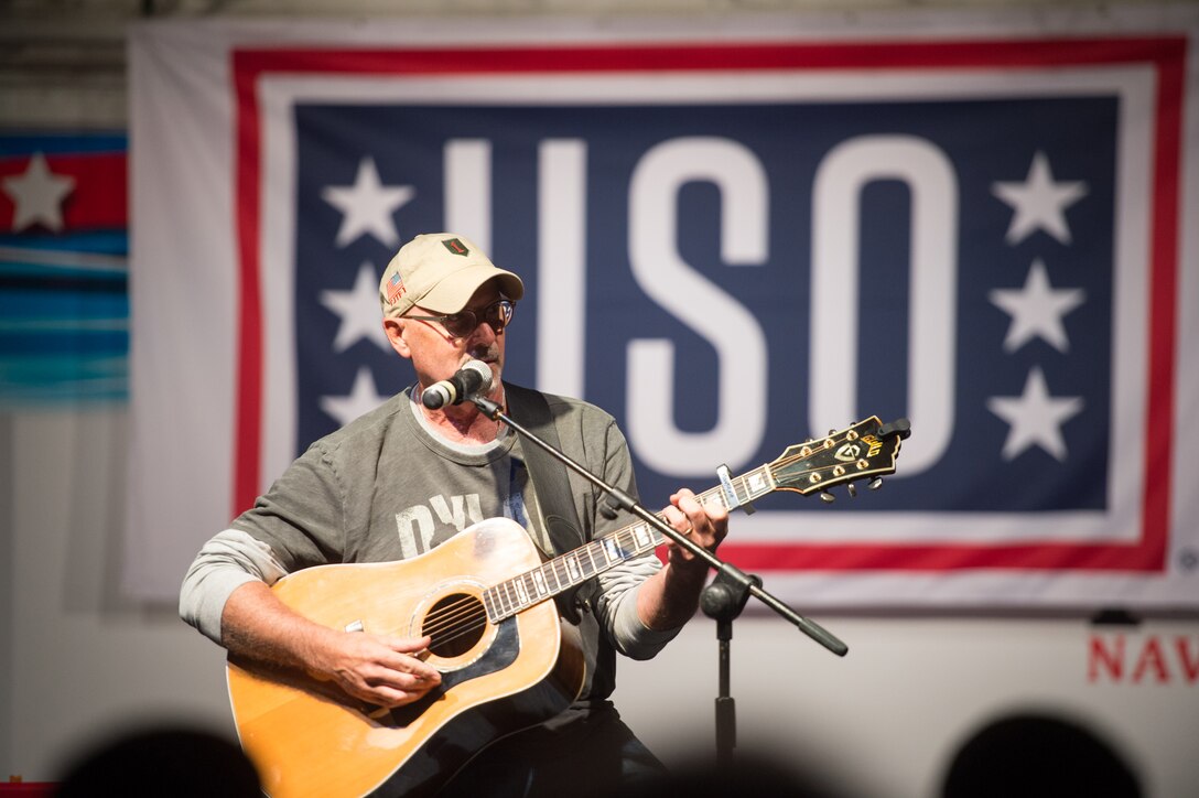 Country music singer-songwriter Billy Montana performs during a USO show on Naval Air Station Sigonella, Italy, Dec. 5, 2015. DoD photo by D. Myles Cullen