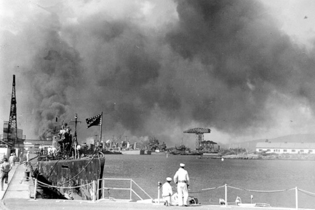 A view of the Pearl Harbor Navy Yard from the Pearl Harbor Submarine Base during the attack on Pearl Harbor, Hawaii, Dec. 7, 1941. U.S. Navy photo