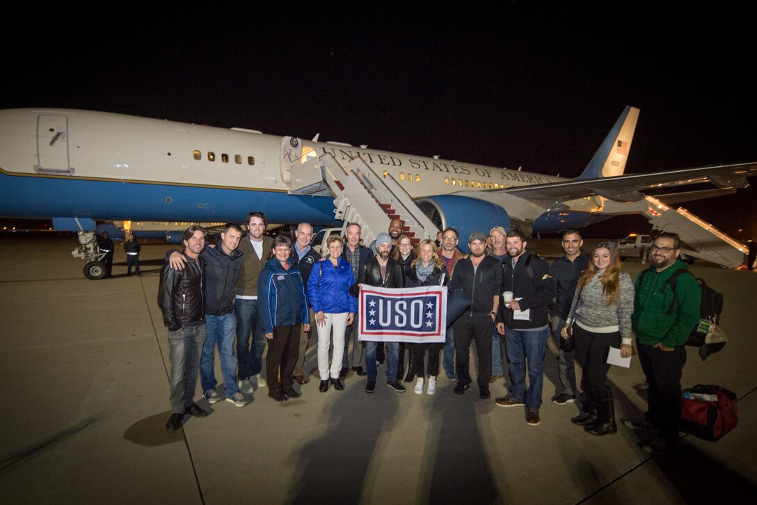 U.S. Marine Corps Gen. Joseph F. Dunford Jr., chairman of the Joint Chiefs of Staff, poses for a group photo with the 2015 USO Entertainment Troupe at the start of the 2015 USO Holiday Tour on Joint Base Andrews, Md., Dec. 4, 2015. DoD photo by D. Myles Cullen