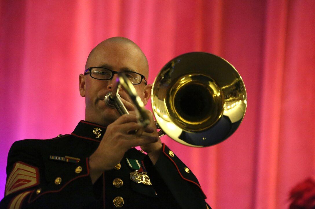 Members of the 2nd Marine Aircraft Wing band perform holiday music during the annual Christmas concert at Marine Corps Air Station Cherry Point, N.C., Dec. 4, 2015. Audience members shared laughs and cheers with other members of the community while also getting the opportunity to donate to the Toys for Tots foundation. The 2nd MAW band has held the traditional concert at the air station as a way to bring both the military and local community together to unwind and share in the holiday spirit. (U.S. Marine Corps photo by Cpl. N.W. Huertas/Released)
