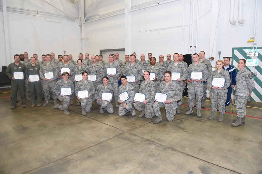 A total of 66 Airmen between two graduating classes received their Community College of the Air Force degrees during commander’s call at the Pittsburgh International Airport Air Reserve Station, Dec. 5, 2015. Several Airmen from the April 2015 class were deployed during the last graduation ceremony, so they received their degrees alongside fellow Airmen of the October 2015 class. (U.S. Air Force photo by Senior Airman Marjorie A. Bowlden)