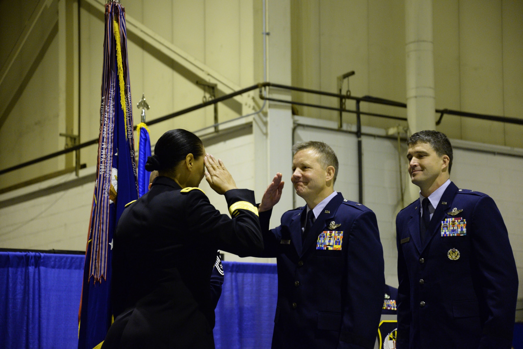 U.S. Air Force Brig. Gen. Scott Kelly, Assistant Adjutant General - Air, salutes U.S. Army Maj. Gen. Linda Singh, Maryland National Guard Adjutant General, at Warfield Air National Guard Base, Baltimore, Md., during a change of command ceremony December 6, 2015. During the ceremony Brig. Gen. Randolph Staudenraus assumed command of the 175th Wing from Kelly. (U.S. Air National Guard photo by Airman 1st Class Enjoli Saunders/RELEASED)