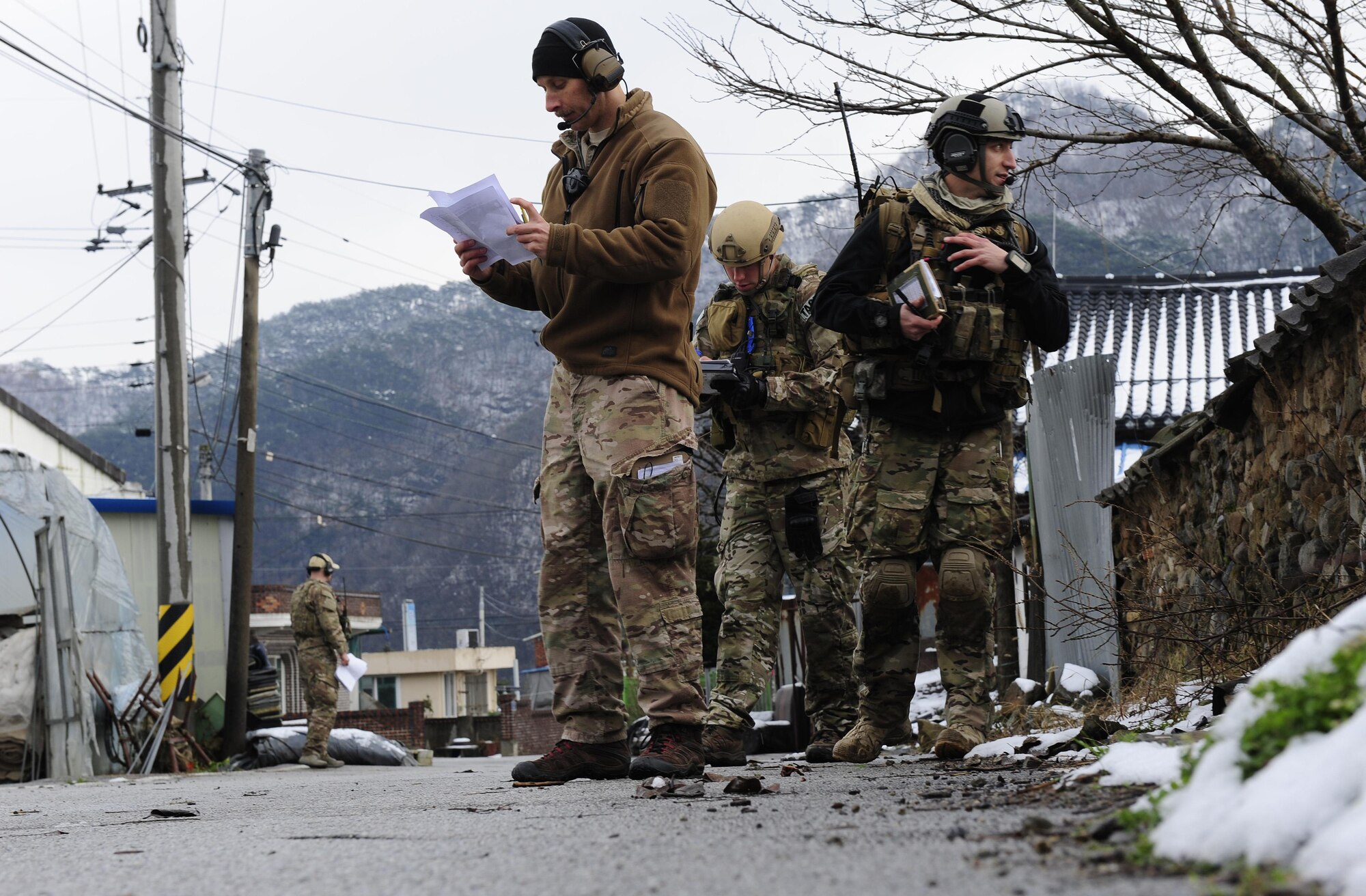 Tactical air control party members use radio systems to coordinate with pilots for air support as part of Exercise Woody Cloud 16-1, Dec. 4, 2015. The scenarios the JTAC Airmen participated in involved close air support and counterinsurgency. (U.S. Air Force photo by Staff Sgt. Nick Wilson/Released) 