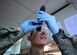 Senior Airman Nickolauss Guier, a 386th Expeditionary Logistics Readiness Squadron fuels systems journeyman, looks through a refractometer while conducting a Fuel System Icing Inhibitor test at an undisclosed location in Southwest Asia, Dec. 1, 2015. The POL flight is responsible for providing fuel to all aircraft, and ground equipment for U.S. and coalition forces on base in support of Operation INHERENT RESOLVE. (U.S. Air Force photo by Staff Sgt. Jerilyn Quintanilla)