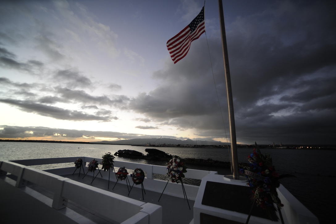 Ceremonial floral wreaths, presented by Pearl Harbor survivors and special guests, honor the loss of USS Utah and her crew as WWII survivors and family members gather for the USS Utah Memorial sunset tribute on Ford Island, Pearl Harbor, Dec. 6, 2015. U.S. Navy photo by Petty Officer 1st Class Meranda Keller