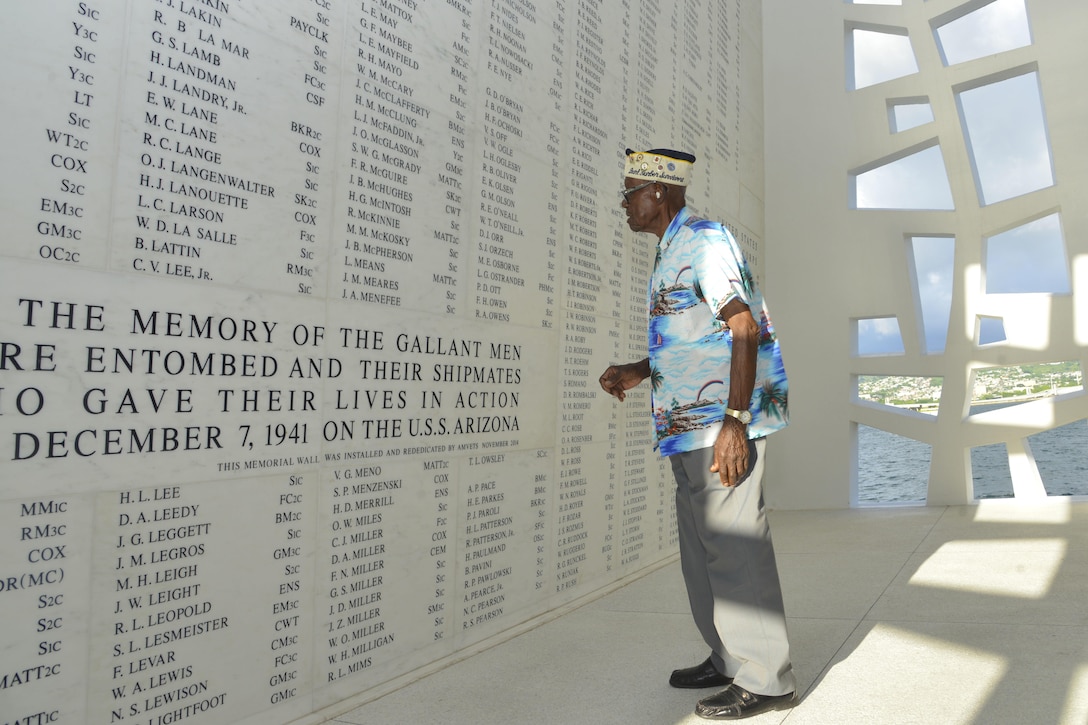 Navy veteran Nelson Mitchell, believed to be the oldest living African-American survivor of the attack on Pearl Harbor, reflects in the shrine room of the USS Arizona Memorial on Joint Base Pearl Harbor-Hickam, Hawaii, Dec. 5, 2015. Mitchell was attending a harbor tour in observance of the 74th anniversary of the Dec. 7, 1941, attack. U.S. Navy photo by Petty Officer 2nd Class Tamara Vaughn