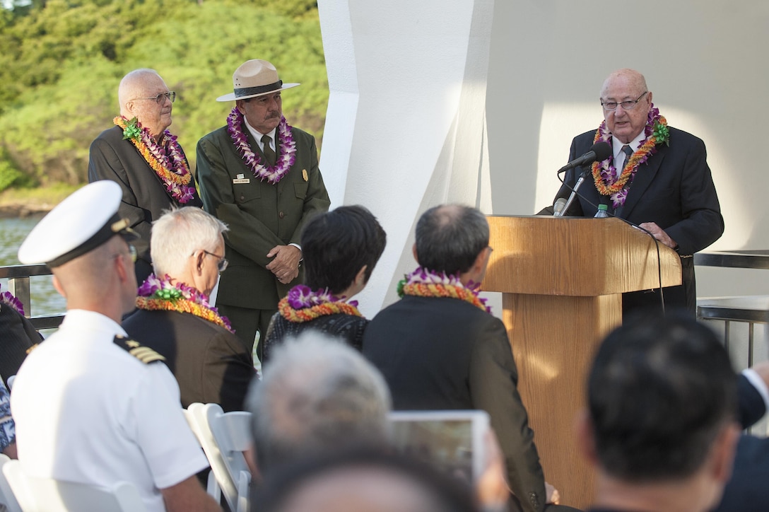 Jack DeTour, a U.S. Air Force retired colonel and World War II veteran, speaks at a Blackened Canteen ceremony as part of the 74th anniversary of Pearl Harbor Day Commemoration Anniversary at the USS Arizona Memorial, Hawaii, Dec. 6, 2015. U.S. Air Force photo by Staff Sgt. Christopher Hubenthal