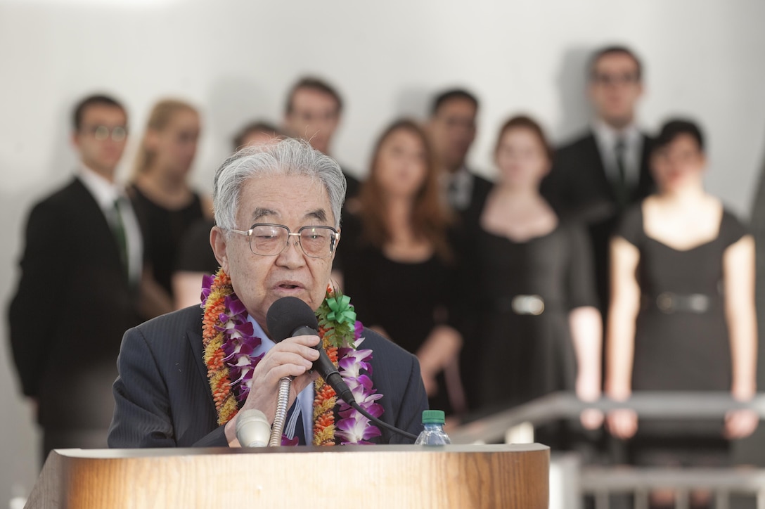 Dr. Hiroya Sugano, director general of the Zero Fighter Admirers Club, speaks at a Blackened Canteen ceremony as part of the 74th anniversary of Pearl Harbor Day Commemoration Anniversary at the USS Arizona Memorial, Hawaii, Dec. 6, 2015. U.S. Air Force photo by Staff Sgt. Christopher Hubenthal