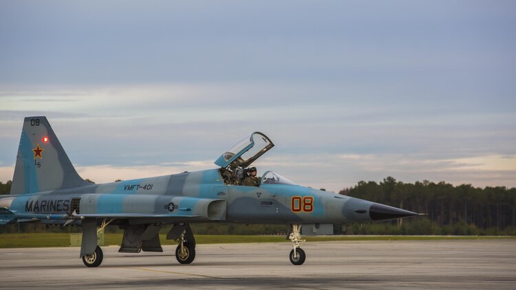 An F-5N Tiger II taxis after landing at Marine Corps Air Station Beaufort, S.C. in Dec. 3, 2015 to support Marine Fighter Attack Training Squadron 501 in air-to-air training from Dec. 2-Dec. 11. Marine Fighter Training Squadron 401 brought five F-5N Tiger II aircraft to support red air for VMFAT-501, an F-35 training squadron. Red air is the adversary forces for air-to-air training simulating threat country tactics. The jet is with VMFT-401.