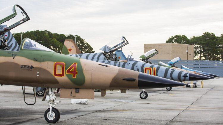 F-5N Tiger II aircraft rest on the flight line aT Marine Corps Air Station Beaufort, S.C. Dec. 3, 2015. The aircraft arrived at the air station to support Marine Fighter Attack Training Squadron 501 in air-to-air training from Dec. 2-Dec. 11. Marine Fighter Training Squadron 401 brought five F-5N Tiger II aircraft to support red air for VMFAT-501. Red air is the adversary forces for air-to-air training. 