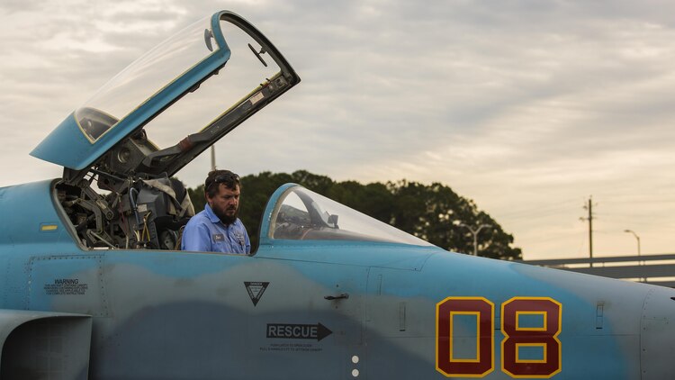 A maintainer checks an F-5N Tiger II at Marine Corps Air Station Beaufort, S.C. Dec. 3, 2015 The aircraft arrived at the air station to support Marine Fighter Attack Training Squadron 501 in air-to-air training from Dec. 2-Dec. 11. Marine Fighter Training Squadron 401 brought five F-5N Tiger II aircraft to support red air for VMFAT-501. Red air is the adversary forces for air-to-air training. 