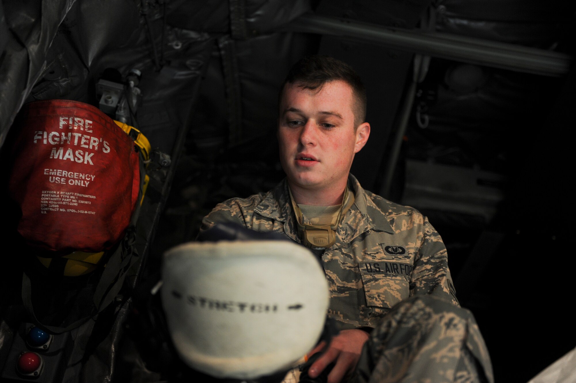 Airman 1st Class Cody Houston, an aircrew flight equipment apprentice with the 4th Special Operations Squadron, inspects a smoke mask during a pre-flight inspection at Hurlburt Field, Fla., Dec. 4, 2015. During pre-flight inspections, equipment is checked to ensure that it is good to go for flight. (U.S. Air Force photo by Senior Airman Krystal M. Garrett)